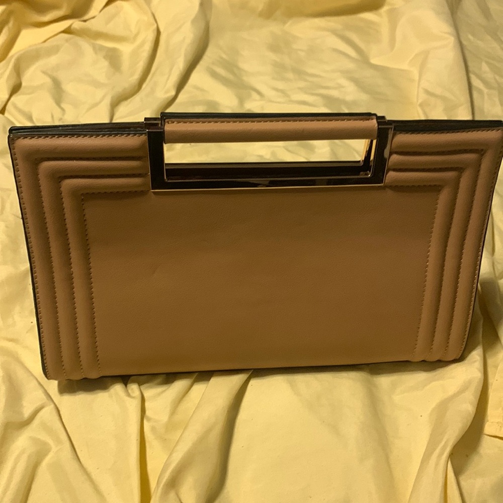 Ladies handbag tan in colour made by melie bianco
